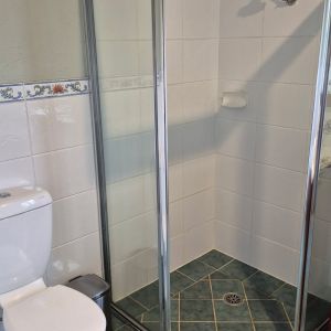 Cottage bathroom with separate shower and bath